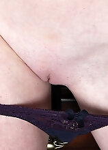 Small Breasted Curly Redhead Ande Exposes Her Older Pussy.