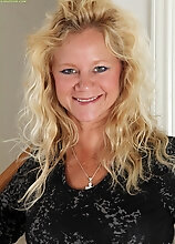 Blond Housewife Ali Jones Exposes Her Trimmed Pussy.